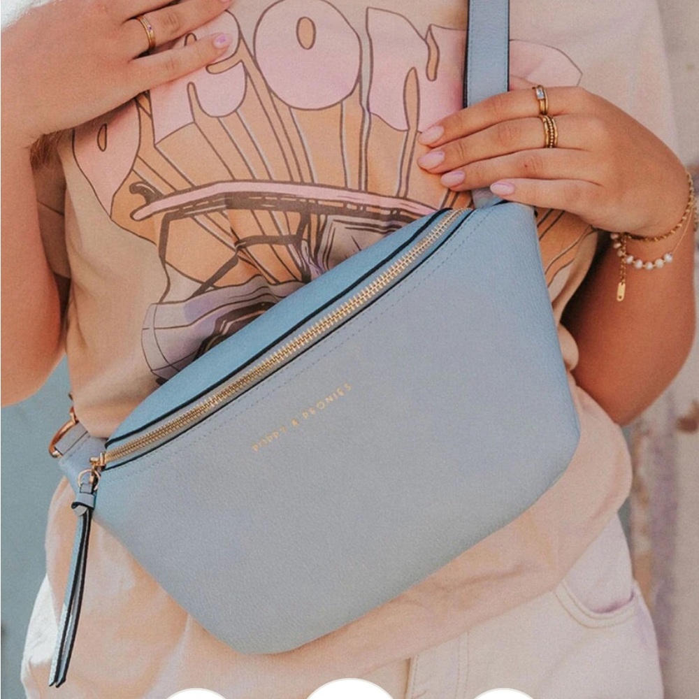 Brand new with tags & dust bag! Sold out sky blue color that may not come back!